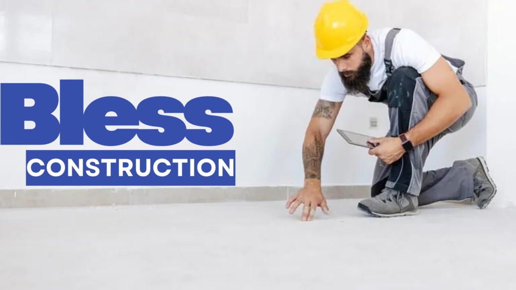 Professional floor contractors installing hardwood flooring in a modern home by Blessconstruction